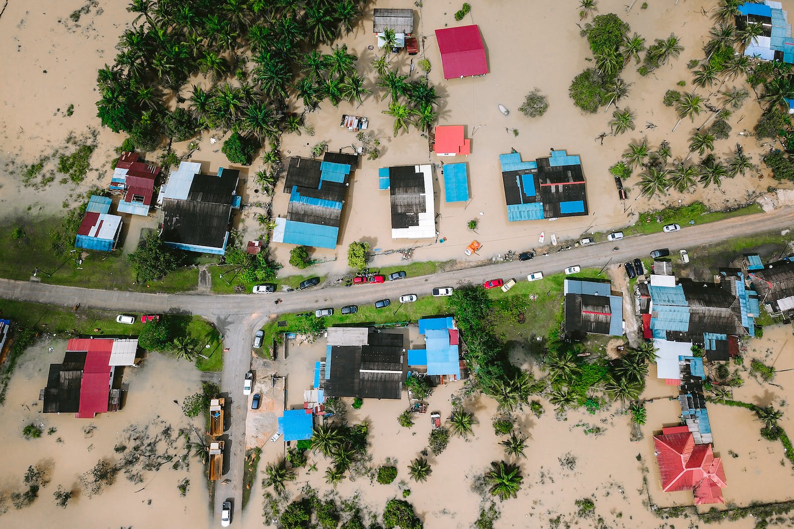 Aerial View of Houses Surrounded by Water in a flood